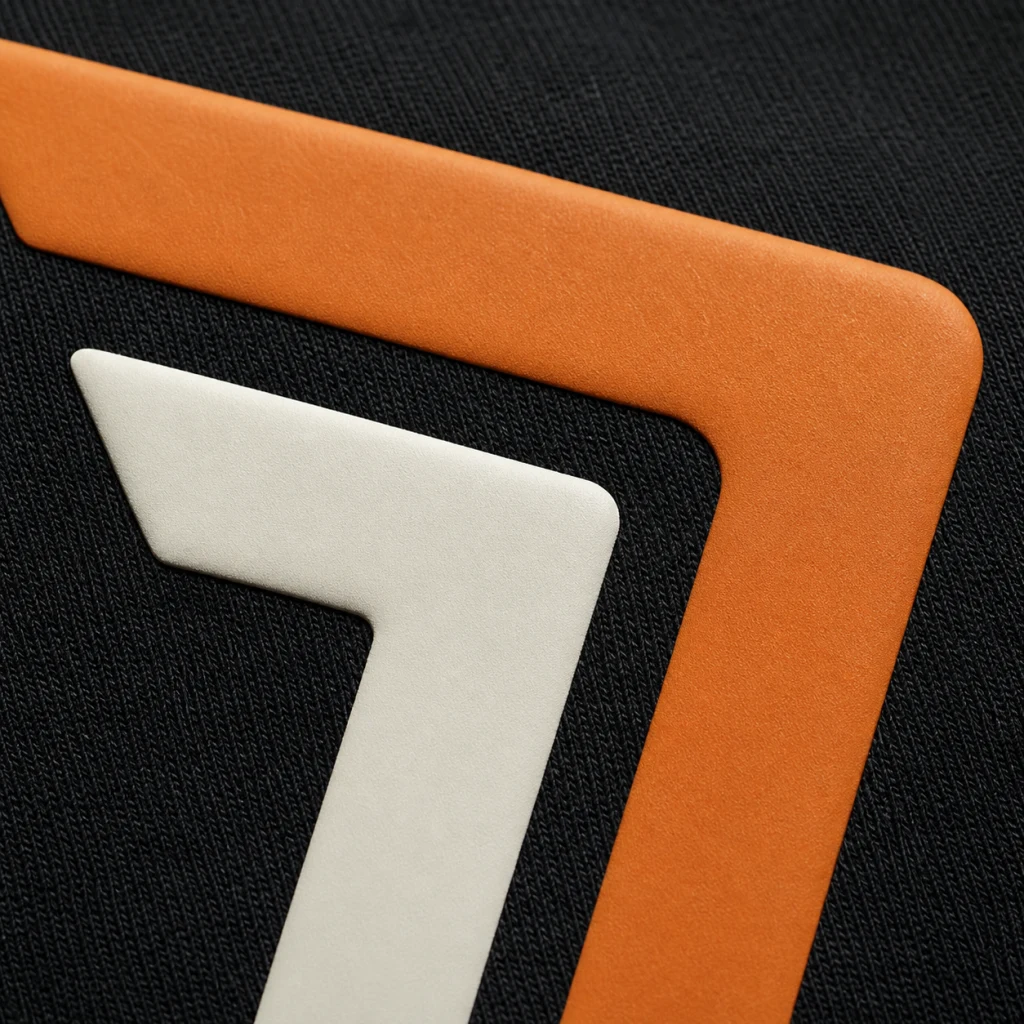Raised silicone rubber print on knit fabric