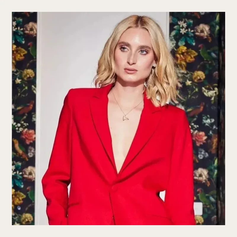 Red tailored coat or suiting project photo supplied by Canton Fashion.
